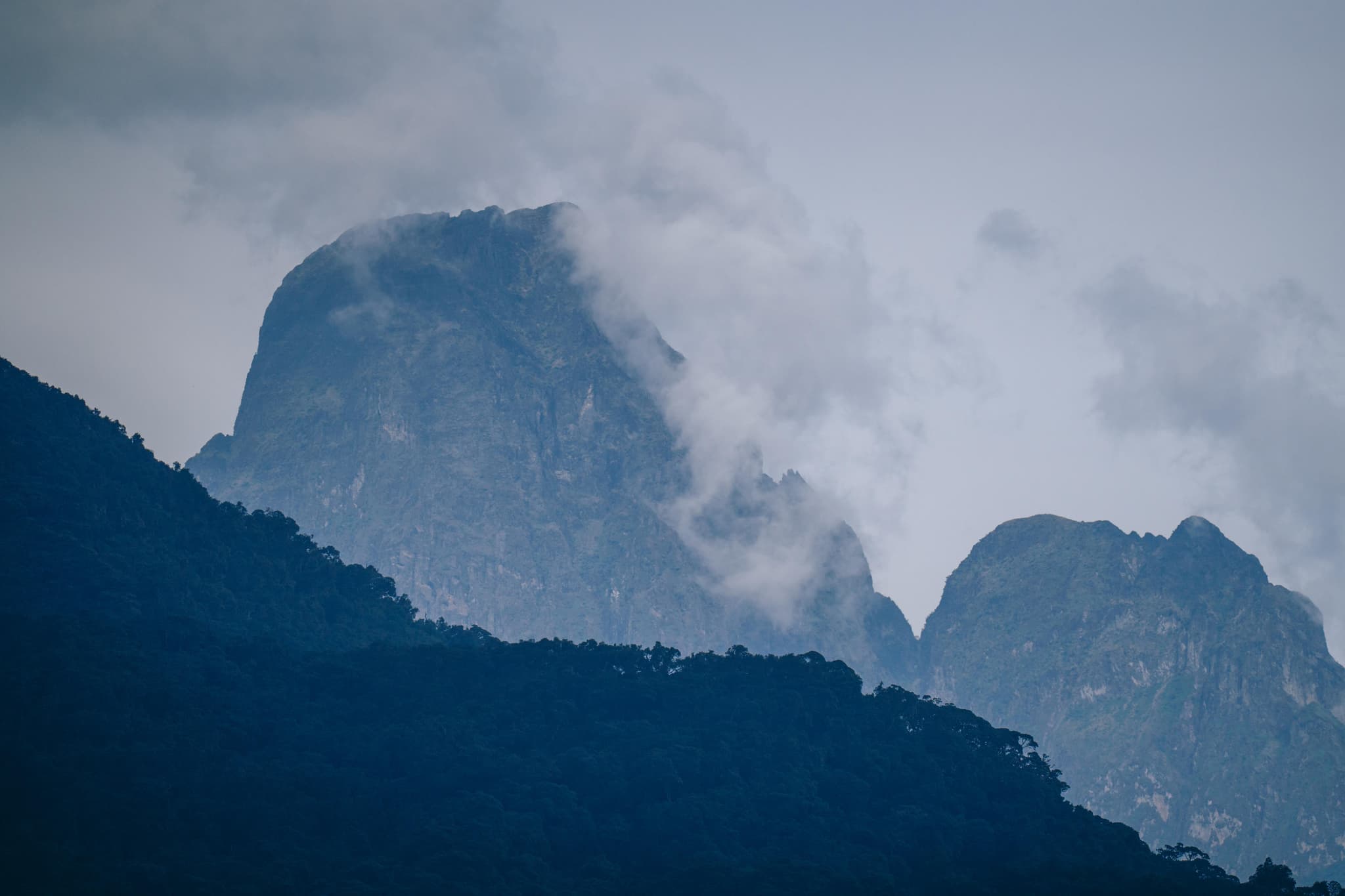 Misty Virunga volcano peaks in the Rwandan highlands