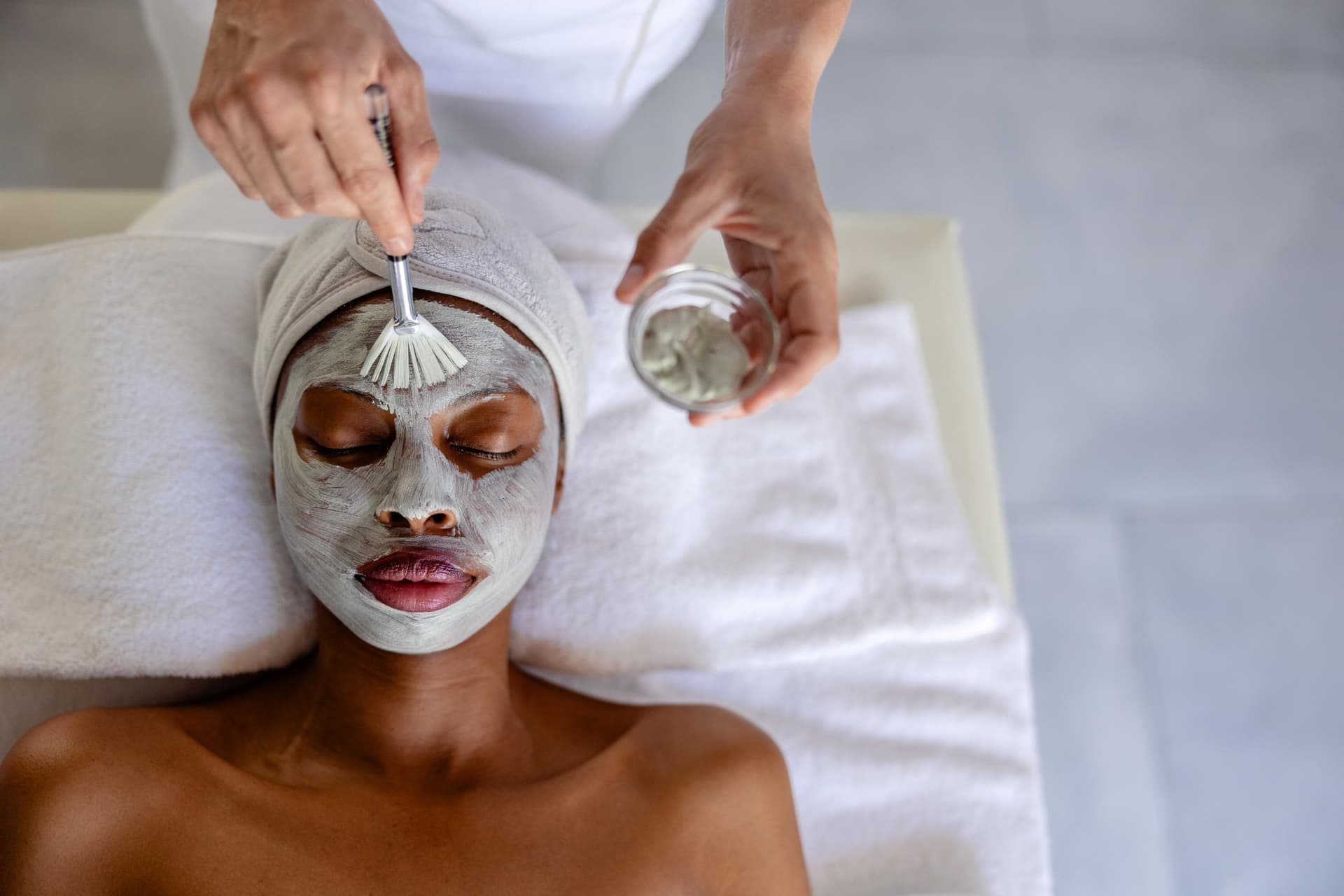 Woman receiving a luxury spa facial treatment